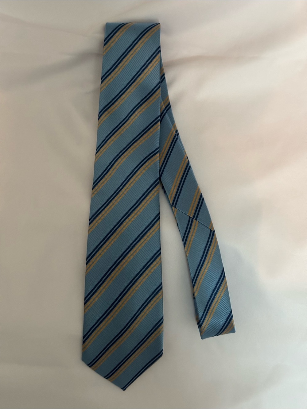 Light Blue Striped Men's Tie with Navy and Gold Accent